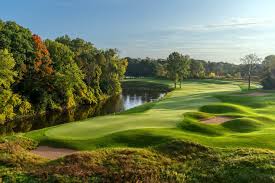 Golf course green and fairway viewed across the course